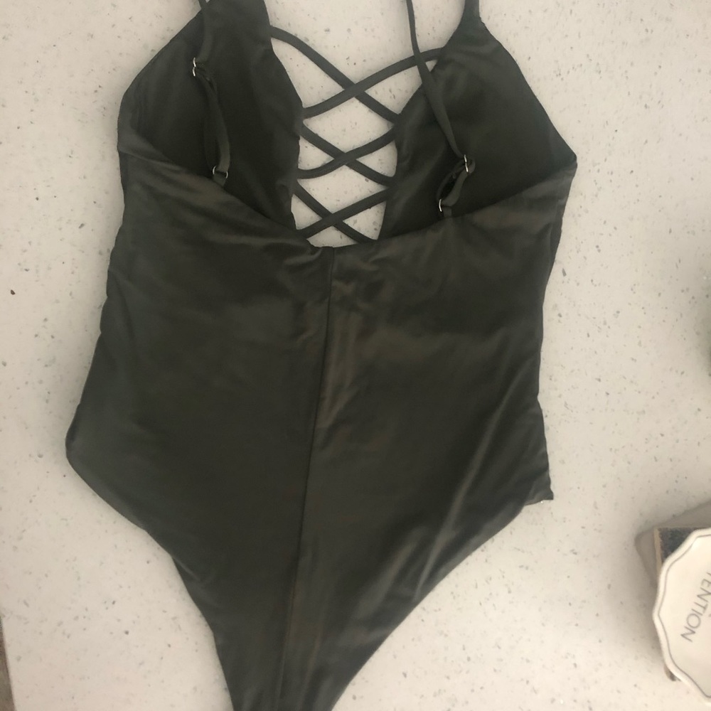 Dippin daisy’s one piece in sage size small